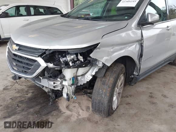 2018 Chevrolet Equinox LT with VIN 3GNAXSEVXJS512561, listed as a IAAI auction lot 43389245 with 163,301 mi miles and . Bid and sale history available at DreamBid. Image 6.