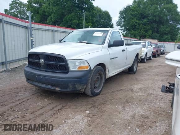 2012 Ram 1500 ST with VIN 3C6JD6DK3CG223910, listed as a IAAI auction lot 42513399 with 177,088 mi miles and . Bid and sale history available at DreamBid. Image 2.