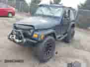 2003 Jeep Wrangler X with VIN 1J4FA39S23P300447, listed as a IAAI auction lot 41791733 with 165,576 mi miles and . Bid and sale history available at DreamBid. Image 17.