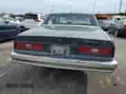 1984 Chevrolet Impala z VIN 1G1AL69H5EX151138, wystawiony jako Copart lot #81291035 z przebiegiem 21 974 mil mil oraz Szkoda całkowita • Salvage title. Historia ofert i sprzedaży dostępna na DreamBid. Obrazek 6.