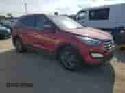 2015 Hyundai Santa Fe with VIN 5XYZUDLB1FG265335, listed as a Copart auction lot 80311595 with 191,440 mi miles and Clean title. Bid and sale history available at DreamBid. Image 4.