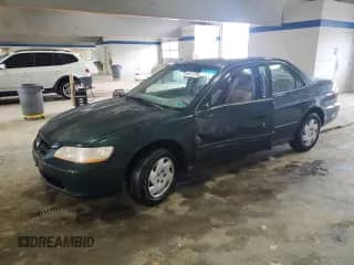 2000 Honda Accord LX с VIN 1HGCG1640YA016330, выставлен на аукционе Copart как лот 50517735 с пробегом 205 493 миль миль и Списание • Salvage title. История ставок и продаж доступна на DreamBid. Изображение 1.