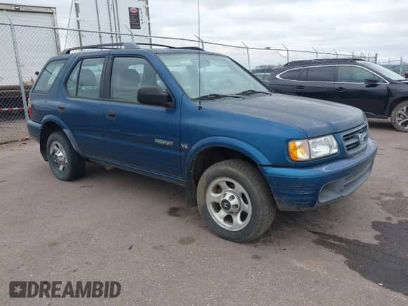 2000 Honda Passport LX with VIN 4S6CK58W6Y4401900, listed as a IAAI auction lot 41961477 with 278,040 mi miles and . Bid and sale history available at DreamBid. Image 1.