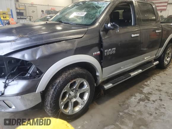 2014 Ram 1500 Laramie with VIN 1C6RR7NT5ES375183, listed as a Copart auction lot 85163365 with 149,376 mi miles and Salvage title. Bid and sale history available at DreamBid. Image 1.