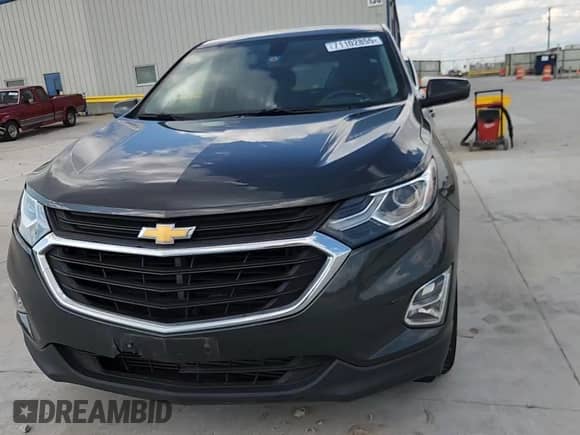 2018 Chevrolet Equinox LT с VIN 2GNAXKEX2J6169017, выставлен на аукционе Copart как лот 71102855 с пробегом 115 202 миль миль и Списание • Salvage title. История ставок и продаж доступна на DreamBid. Изображение 14.
