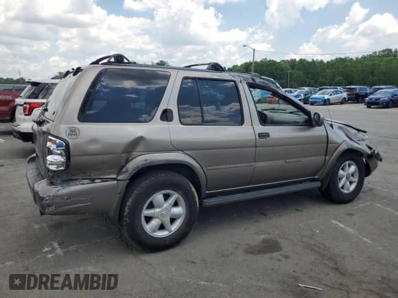 2001 Nissan Pathfinder LE with VIN JN8DR09X11W570874, listed as a Copart auction lot 63546835 with 200,612 mi miles and Salvage title. Bid and sale history available at DreamBid. Image 3.
