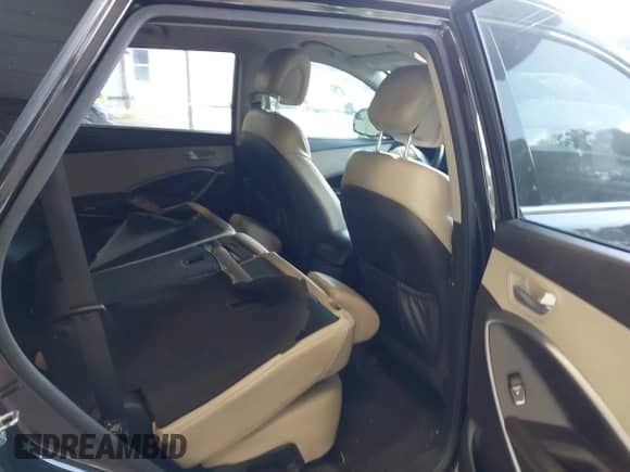 2016 Hyundai Santa Fe SE with VIN KM8SMDHFXGU154677, listed as a IAAI auction lot 42573713 with 173,434 mi miles and . Bid and sale history available at DreamBid. Image 8.