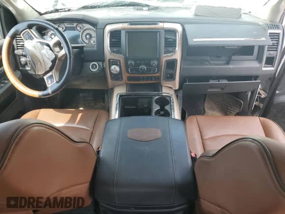 2014 Ram 1500 Longhorn z VIN 1C6RR7PM6ES403403, wystawiony jako Copart lot #55445445 z przebiegiem Nie podano mil oraz Szkoda całkowita • Salvage title. Historia ofert i sprzedaży dostępna na DreamBid. Obrazek 8.