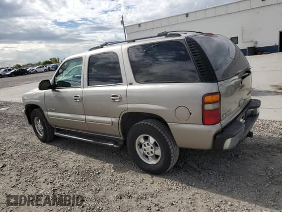 2001 Chevrolet Tahoe LT with VIN 1GNEK13T21J246434, listed as a Copart auction lot 85704855 with 230,449 mi miles and Salvage title. Bid and sale history available at DreamBid. Image 2.