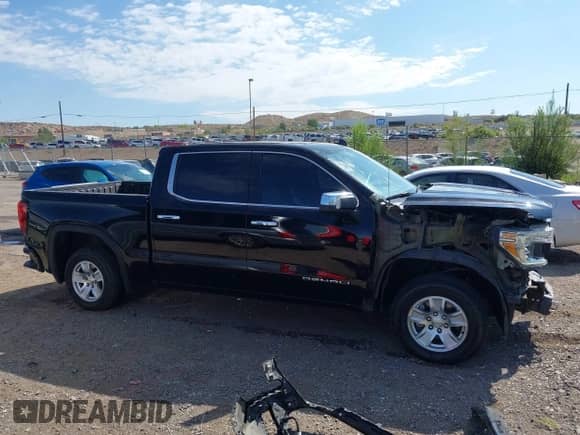 2021 GMC Sierra 1500 Denali z VIN 3GTU9FETXMG422324, wystawiony jako IAAI lot #43121547 z przebiegiem 55 757 mil mil oraz . Historia ofert i sprzedaży dostępna na DreamBid. Obrazek 14.