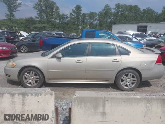 2012 Chevrolet Impala LT Fleet z VIN 2G1WG5E37C1101107, wystawiony jako IAAI lot #42863147 z przebiegiem 188 750 mil mil oraz . Historia ofert i sprzedaży dostępna na DreamBid. Obrazek 13.