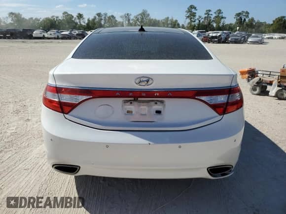 2013 Hyundai Azera с VIN KMHFH4JG7DA280582, выставлен на аукционе Copart как лот 76571554 с пробегом 215 540 миль миль и Чистый • Clean title. История ставок и продаж доступна на DreamBid. Изображение 6.