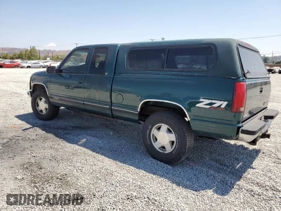 1998 Chevrolet Silverado 1500 z VIN 2GCEK19R0W1158312, wystawiony jako Copart lot #68561985 z przebiegiem 196 500 mil mil oraz Szkoda całkowita • Salvage title. Historia ofert i sprzedaży dostępna na DreamBid. Obrazek 2.