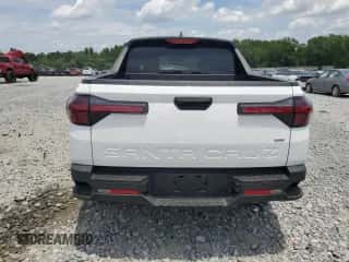 2024 Hyundai Santa Cruz SEL с VIN 5NTJBDAE7RH083654, выставлен на аукционе Copart как лот 57636384 с пробегом 11 528 миль миль и Списание • Salvage title. История ставок и продаж доступна на DreamBid. Изображение 6.