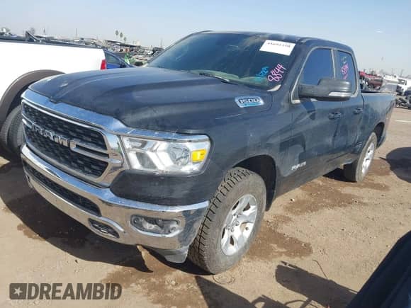 2022 Ram 1500 Big Horn with VIN 1C6RRFBG9NN279573, listed as a IAAI auction lot 41692350 with 48,587 mi miles and . Bid and sale history available at DreamBid. Image 2.