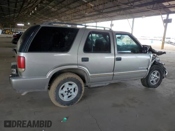 2004 Chevrolet Blazer LS z VIN 1GNDT13X84K120850, wystawiony jako Copart lot #72561234 z przebiegiem 188 094 mil mil oraz Szkoda całkowita • Salvage title. Historia ofert i sprzedaży dostępna na DreamBid. Obrazek 3.