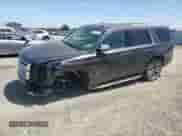 2016 Chevrolet Tahoe LTZ with VIN 1GNSCCKC0GR203654, listed as a Copart auction lot 54906895 with 74,805 mi miles and Salvage title. Bid and sale history available at DreamBid. Image 1.