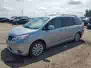 2014 Toyota Sienna Limited z VIN 5TDDK3DC2ES081069, wystawiony jako Copart lot #69018955 z przebiegiem 141 754 mil mil oraz Szkoda całkowita • Salvage title. Historia ofert i sprzedaży dostępna na DreamBid. Obrazek 1.