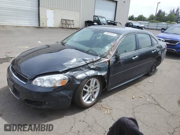 2016 Chevrolet Impala LTZ with VIN 2G1WC5E39G1149922, listed as a Copart auction lot 61812415 with 129,219 mi miles and Salvage title. Bid and sale history available at DreamBid. Image 1.