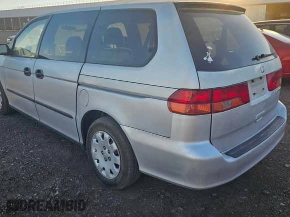 2001 Honda Odyssey LX с VIN 2HKRL18501H617598, выставлен на аукционе Copart как лот 85605014 с пробегом 125 333 миль миль и Чистый • Clean title. История ставок и продаж доступна на DreamBid. Изображение 3.
