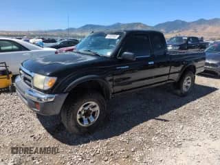 1999 Toyota Tacoma PreRunner with VIN 4TASN92N9XZ456376, listed as a Copart auction lot 64320465 with 218,217 mi miles and Salvage title. Bid and sale history available at DreamBid. Image 1.
