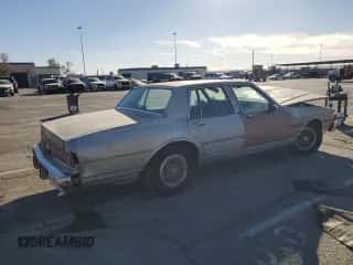 1986 Chevrolet Caprice Classic Brougham с VIN 1G1BN69Z4GX107626, выставлен на аукционе Copart как лот 42607765 с пробегом 90 001 миль миль и Списание • Salvage title. История ставок и продаж доступна на DreamBid. Изображение 3.