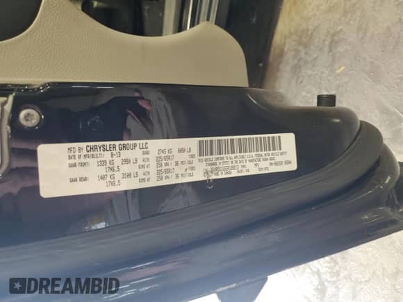 2014 Dodge Grand Caravan SXT 30th Anniversary with VIN 2C4RDGCG5ER128213, listed as a Copart auction lot 65019185 with 169,652 mi miles and Clean title. Bid and sale history available at DreamBid. Image 13.