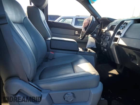 2014 Ford F-150 XLT с VIN 1FTFW1EF5EKE56941, выставлен на аукционе Copart как лот 82374955 с пробегом Не указан миль и Списание • Salvage title. История ставок и продаж доступна на DreamBid. Изображение 7.