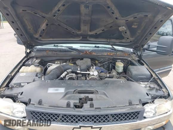 2002 Chevrolet Silverado 2500HD LS z VIN 1GCHK29132E156611, wystawiony jako IAAI lot #42227369 z przebiegiem 342 075 mil mil oraz . Historia ofert i sprzedaży dostępna na DreamBid. Obrazek 17.