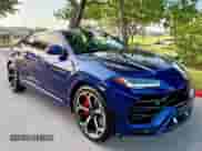 2021 Lamborghini Urus with VIN ZPBUA1ZL0MLA13913, listed as a Copart auction lot 84061045 with 32,057 mi miles and Salvage title. Bid and sale history available at DreamBid. Image 1.