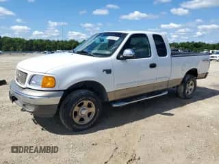 2004 Ford F-150 XL with VIN 2FTRX18W34CA64873, listed as a Copart auction lot 63946475 with 73,423 mi miles and Salvage title. Bid and sale history available at DreamBid. Image 1.