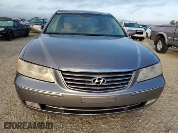 2006 Hyundai Azera SE с VIN KMHFC46F66A117570, выставлен на аукционе Copart как лот 79708844 с пробегом 131 877 миль миль и Списание • Salvage title. История ставок и продаж доступна на DreamBid. Изображение 5.