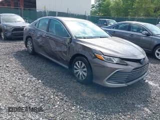 2023 Toyota Camry Hybrid LE with VIN 4T1C31AK7PU602628, listed as a IAAI auction lot 42251198 with 50,731 mi miles and . Bid and sale history available at DreamBid. Image 1.