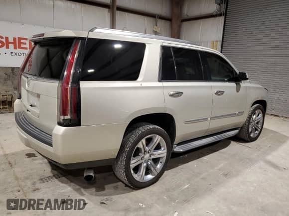 2015 Cadillac Escalade z VIN 1GYS4AKJ1FR100437, wystawiony jako Copart lot #44642635 z przebiegiem 51 581 mil mil oraz Czysty tytuł • Clean title. Historia ofert i sprzedaży dostępna na DreamBid. Obrazek 3.