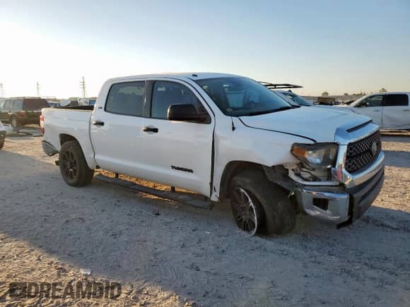 2019 Toyota Tundra SR5 с VIN 5TFEM5F1XKX137500, выставлен на аукционе Copart как лот 85751375 с пробегом 158 655 миль миль и Списание • Salvage title. История ставок и продаж доступна на DreamBid. Изображение 4.