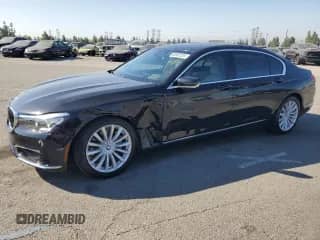 2018 BMW 7 Series 740i with VIN WBA7E2C59JG741921, listed as a Copart auction lot 66907325 with 62,678 mi miles and Salvage title. Bid and sale history available at DreamBid. Image 1.