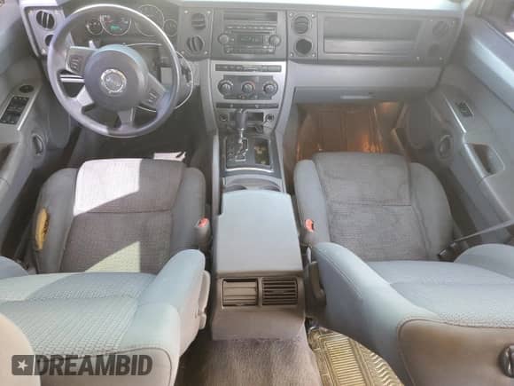2007 Jeep Commander Sport z VIN 1J8HG48K87C653673, wystawiony jako Copart lot #50771524 z przebiegiem 213 411 mil mil oraz Szkoda całkowita • Salvage title. Historia ofert i sprzedaży dostępna na DreamBid. Obrazek 8.