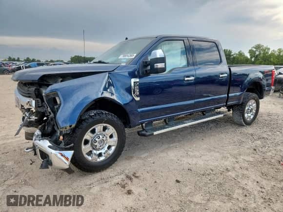 2019 Ford F-250 XL with VIN 1FT7W2B61KEG23031, listed as a Copart auction lot 70854365 with 98,875 mi miles and Salvage title. Bid and sale history available at DreamBid. Image 1.
