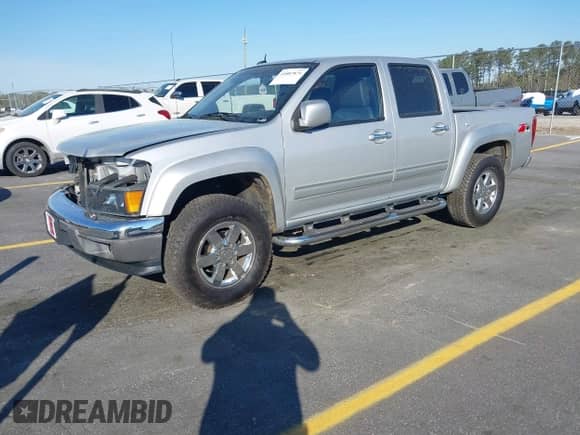 2012 Chevrolet Colorado 2LT with VIN 1GCHTDFE2C8151285, listed as a IAAI auction lot 41887874 with 187,642 mi miles and . Bid and sale history available at DreamBid. Image 18.