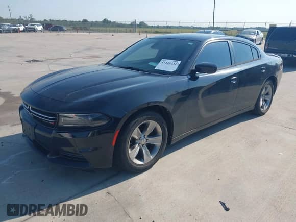 2015 Dodge Charger SE with VIN 2C3CDXBG8FH815267, listed as a IAAI auction lot 43220231 with 101,540 mi miles and . Bid and sale history available at DreamBid. Image 2.