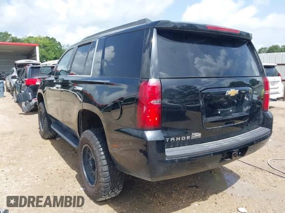 2019 Chevrolet Tahoe LS with VIN 1GNSKAKC0KR359757, listed as a IAAI auction lot 42696398 with Not provided miles and . Bid and sale history available at DreamBid. Image 3.