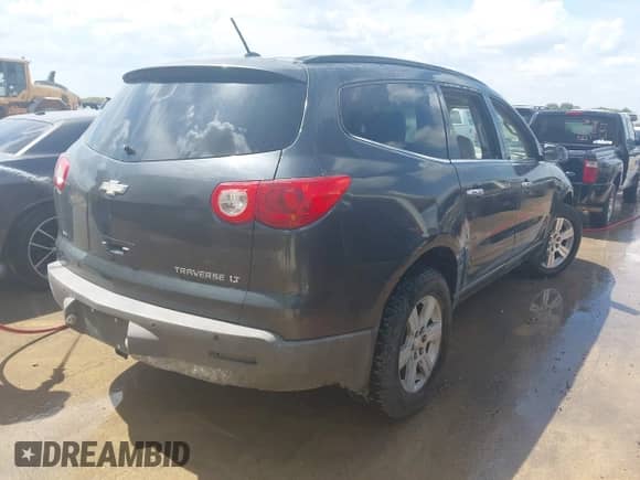 2011 Chevrolet Traverse 2LT z VIN 1GNKVJED5BJ112308, wystawiony jako IAAI lot #43008167 z przebiegiem 164 022 mil mil oraz . Historia ofert i sprzedaży dostępna na DreamBid. Obrazek 4.