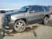 2011 Cadillac Escalade with VIN 1GYS3AEF4BR161964, listed as a Copart auction lot 83394334 with 147,525 mi miles and Salvage title. Bid and sale history available at DreamBid. Image 1.