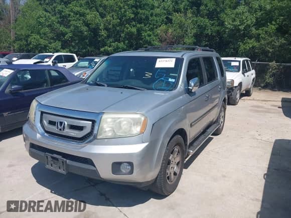 2010 Honda Pilot Touring with VIN 5FNYF3H94AB022723, listed as a IAAI auction lot 42378211 with 326,338 mi miles and . Bid and sale history available at DreamBid. Image 2.