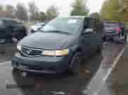 2003 Honda Odyssey EX z VIN 5FNRL18603B054627, wystawiony jako IAAI lot #43413800 z przebiegiem 201 434 mil mil oraz . Historia ofert i sprzedaży dostępna na DreamBid. Obrazek 16.