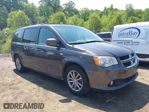 2014 Dodge Grand Caravan SXT with VIN 2C4RDGCG1ER366222, listed as a IAAI auction lot 42454269 with 133,796 mi miles and . Bid and sale history available at DreamBid. Image 1.