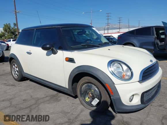 2013 MINI Hardtop with VIN WMWSU3C50DT679002, listed as a IAAI auction lot 43530940 with 59,731 mi miles and . Bid and sale history available at DreamBid. Image 1.