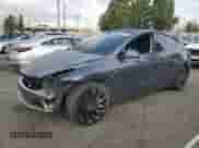 2023 Tesla Model Y Performance with VIN 7SAYGDEF7PF958571, listed as a Copart auction lot 84988605 with 40,428 mi miles and Salvage title. Bid and sale history available at DreamBid. Image 1.