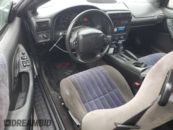2002 Chevrolet Camaro с VIN 2G1FP22K322123091, выставлен на аукционе Copart как лот 89440345 с пробегом 130 075 миль миль и Чистый • Clean title. История ставок и продаж доступна на DreamBid. Изображение 8.