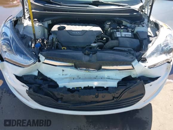 2014 Hyundai Veloster z VIN KMHTC6AD4EU213537, wystawiony jako IAAI lot #43358808 z przebiegiem 54 973 mil mil oraz . Historia ofert i sprzedaży dostępna na DreamBid. Obrazek 10.